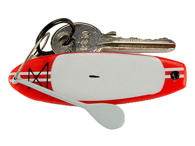 Keychain with a red miniature stand up paddleboard and keys on a white background